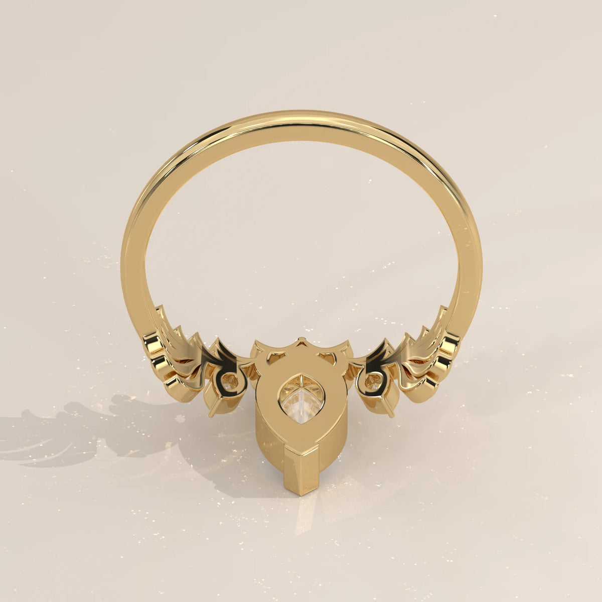 Marquise Lab Grown Diamond Ring with Carved Leaf Wings in yellow gold, product photograph on a plain background.
