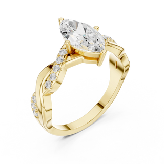 Angle View: Marquise Diamond Ring with Prong Setting and Twisted Pavé Accents in 18K Yellow Gold – Lab Grown – Driona Jewels
