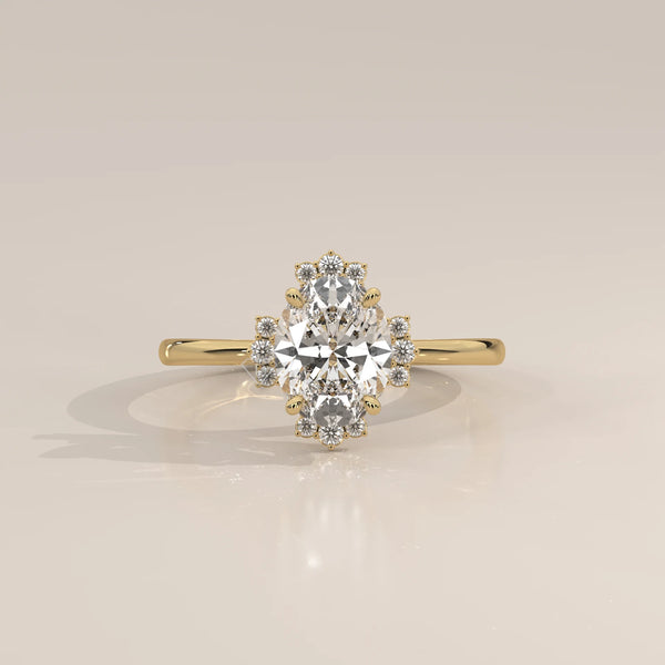 Oval Lab Grown Diamond Ring with Crown Style Partial Halo in yellow gold, shown from the front.