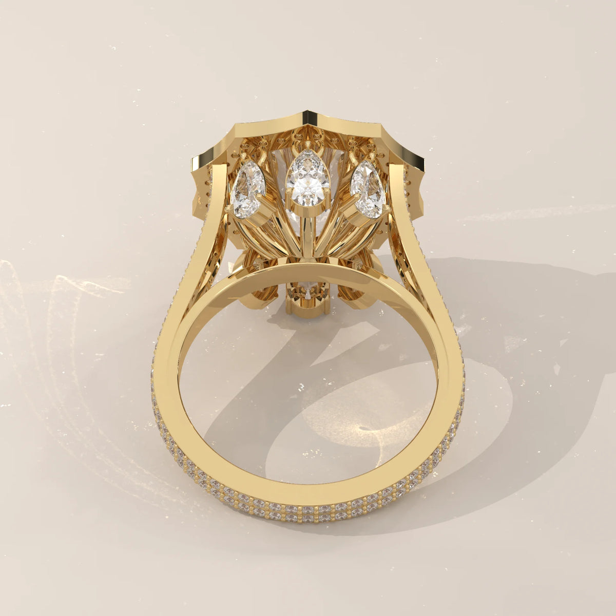 Round Lab Grown Diamond Twelve Point Halo Ring with Split Shank in yellow gold, shown on a plain background.
