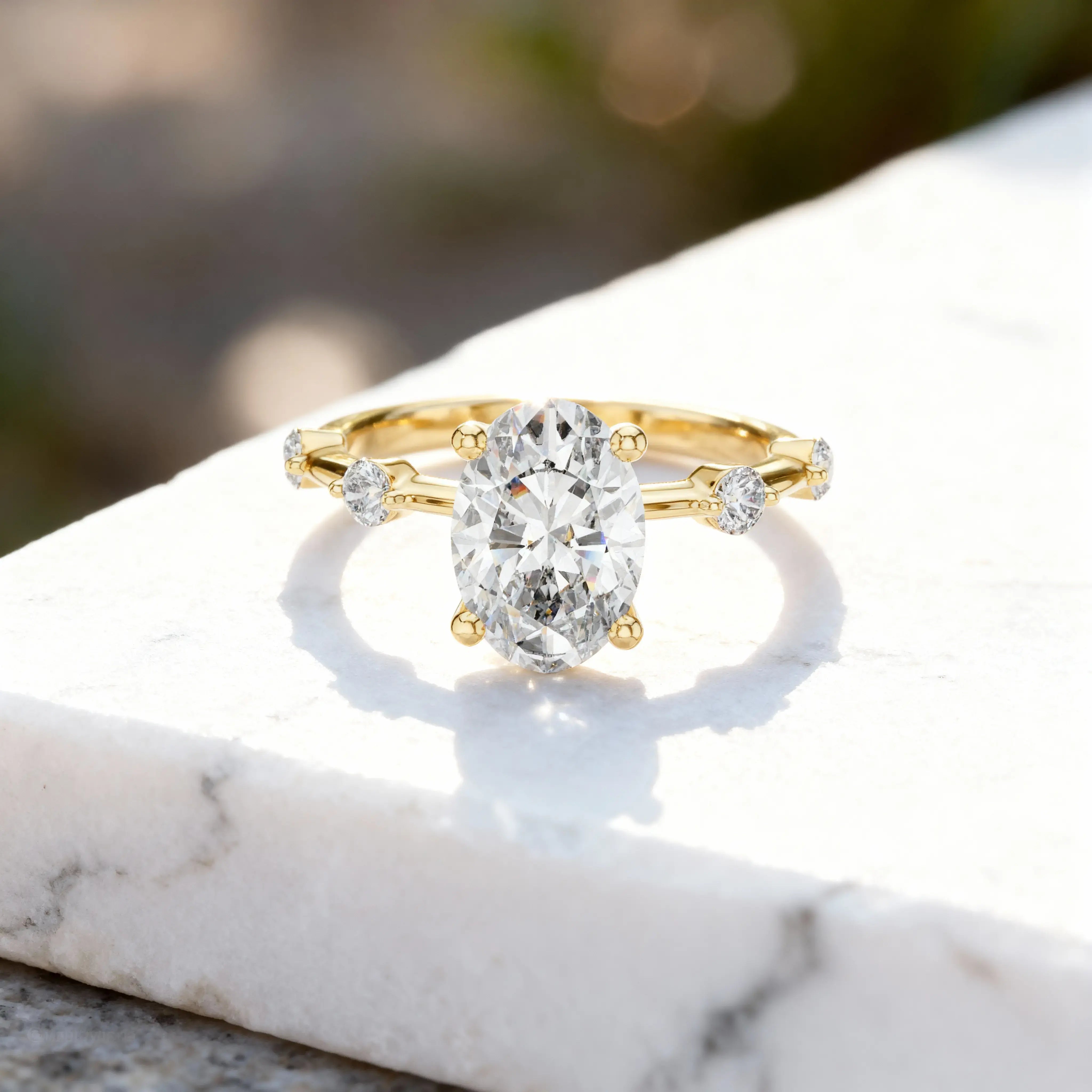 Flat Lay: Oval Diamond Ring with Halo Setting in 14k Yellow Gold - Lab Grown - Driona Jewels