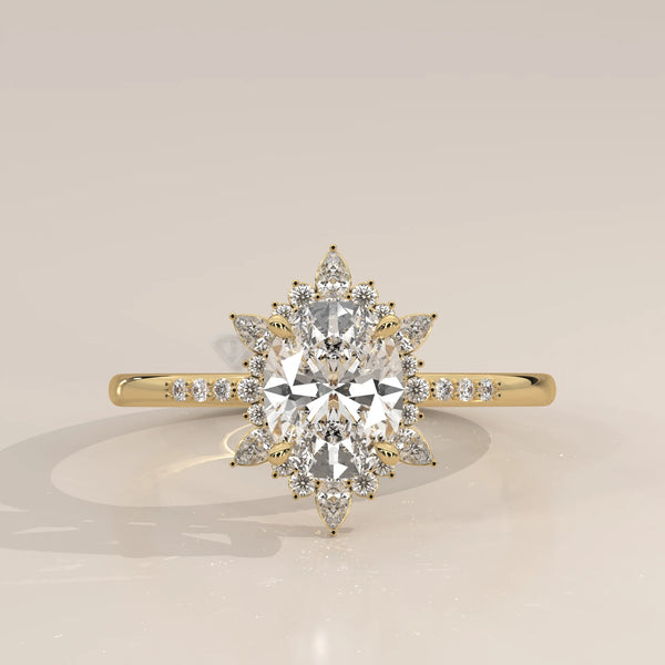 Yellow gold engagement ring with an oval diamond and a sunburst halo.