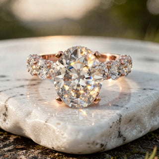 Close-up: Oval Diamond Ring with Three Stone Setting in 14k Rose Gold - Lab Grown - Driona Jewels