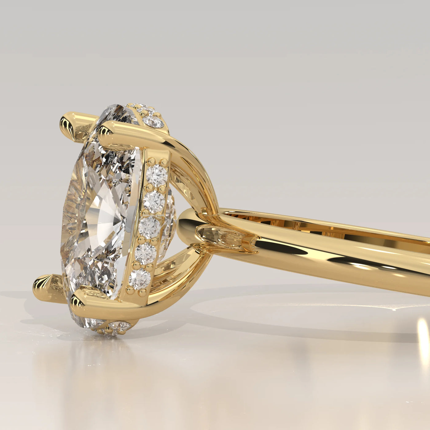 Close-up of a beautiful oval diamond engagement ring in yellow gold.