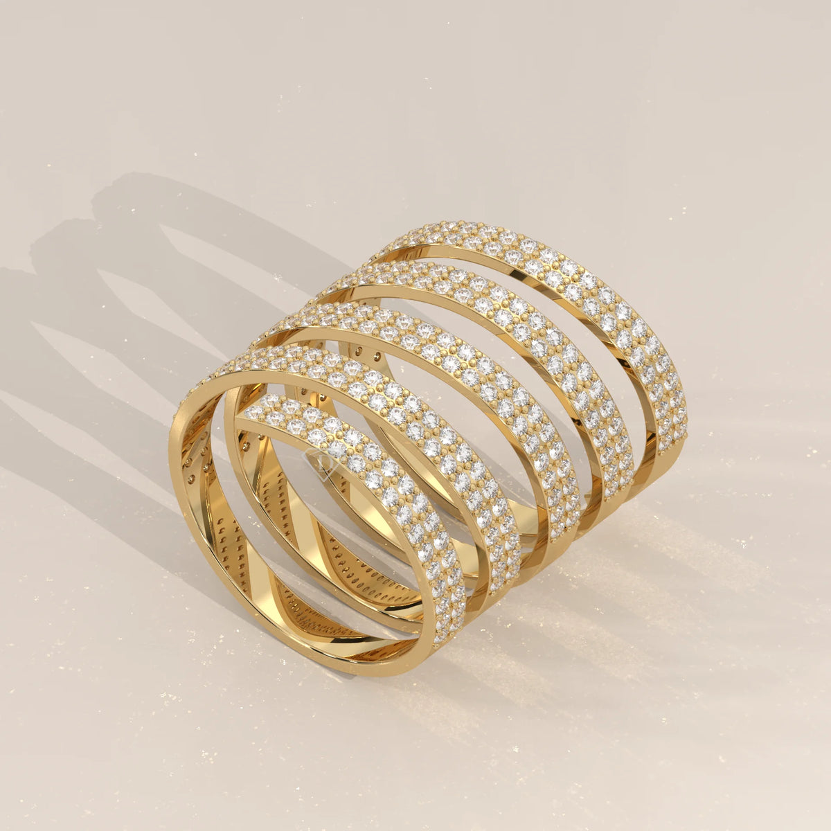 Round Lab Grown Diamond Five Coil Wrap Ring with Triple Row Pave in yellow gold, shown at an angle.