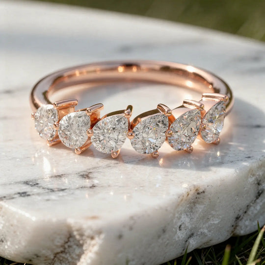 Close-up: Pear Cut Diamond Ring with Channel Setting in 14k Rose Gold - Lab Grown - Driona Jewels