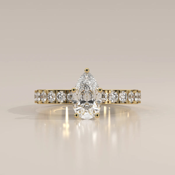 Pear Lab Grown Diamond Solitaire on a Wide Bold Pave Band in yellow gold, shown from the front.