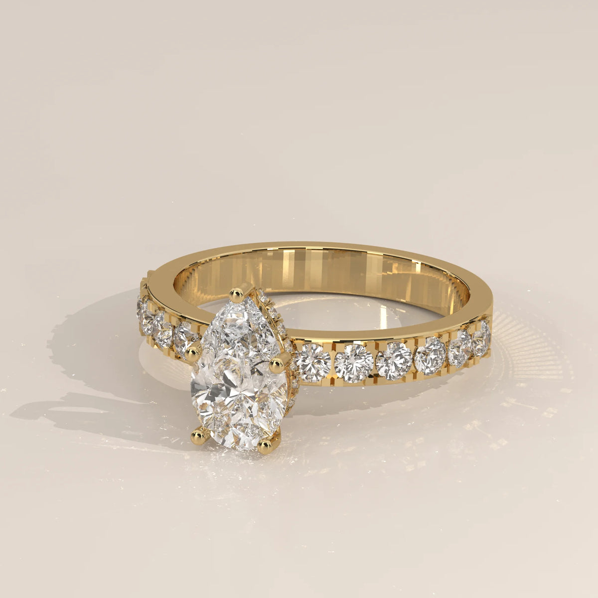 Pear Lab Grown Diamond Solitaire on a Wide Bold Pave Band in yellow gold, side profile view.