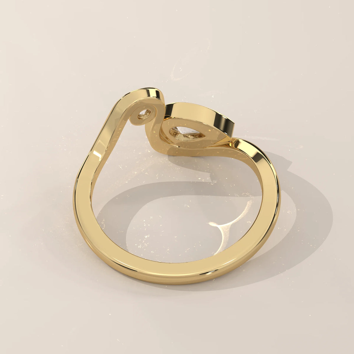 Pear Lab Grown Diamond Swirl Ring with Bezel Set Round Accent in yellow gold, side profile view.