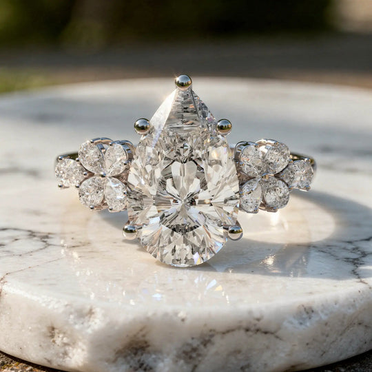 Close-up: Pear Cut Diamond Ring with Halo Setting in 14k White Gold - Lab Grown - Driona Jewels