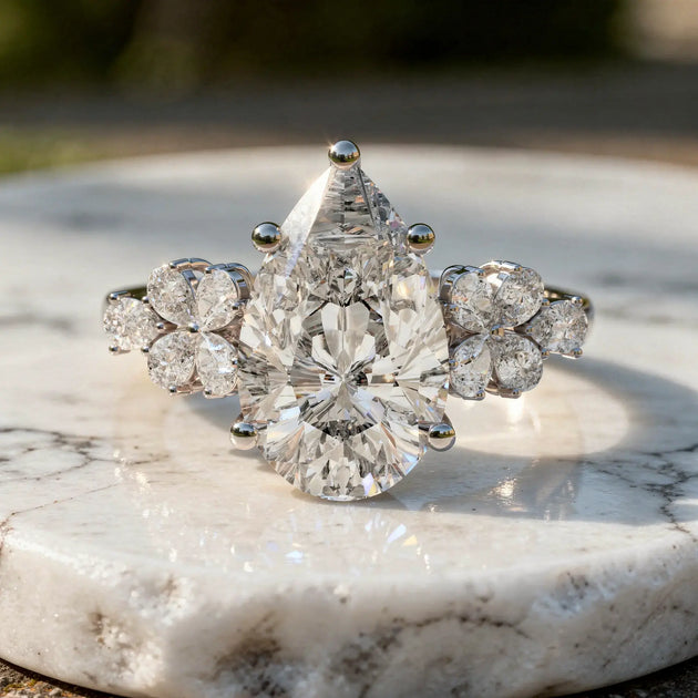 Close-up: Pear Cut Diamond Ring with Halo Setting in 14k White Gold - Lab Grown - Driona Jewels