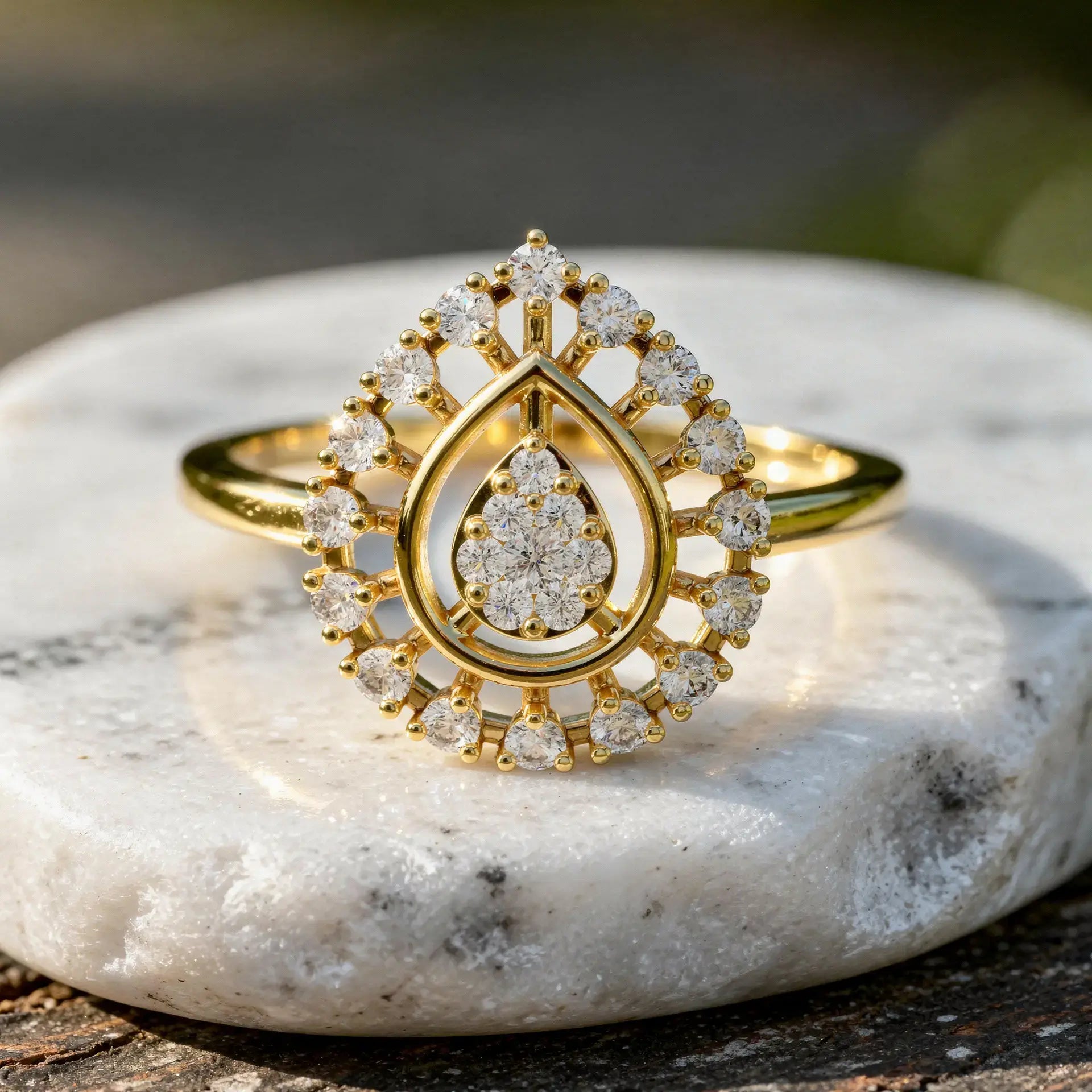 Close-up: Pear Cut Diamond Ring with Halo Setting in 14k Yellow Gold - Lab Grown - Driona Jewels