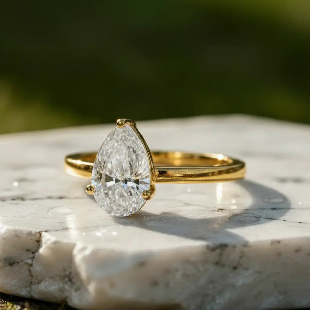 Front-view: Pear Diamond Ring with Solitaire Setting in 14k Yellow Gold - Lab Grown - Driona Jewels