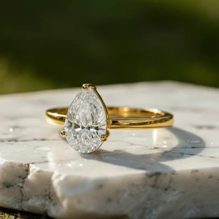 Front-view: Pear Diamond Ring with Solitaire Setting in 14k Yellow Gold - Lab Grown - Driona Jewels