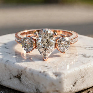 Front-view: Pear Cut Diamond Ring with Three-Stone Setting in 14k Rose Gold - Lab Grown - Driona Jewels