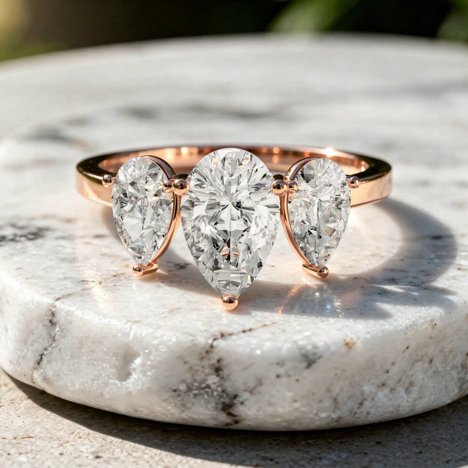 Front-view: Pear Cut Diamond Three Stone with Three-Stone Setting in 14k Rose Gold - Lab Grown - Driona Jewels