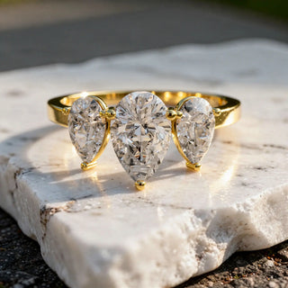 Front-view: Pear Cut Diamond Three Stone Ring with Three-stone Setting in 14k Yellow Gold - Lab Grown - Driona Jewels