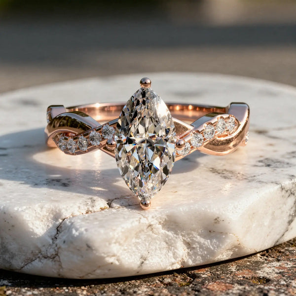 Front-view: Pear Cut Diamond Ring with Twist Setting in 14k Rose Gold - Lab Grown - Driona Jewels
