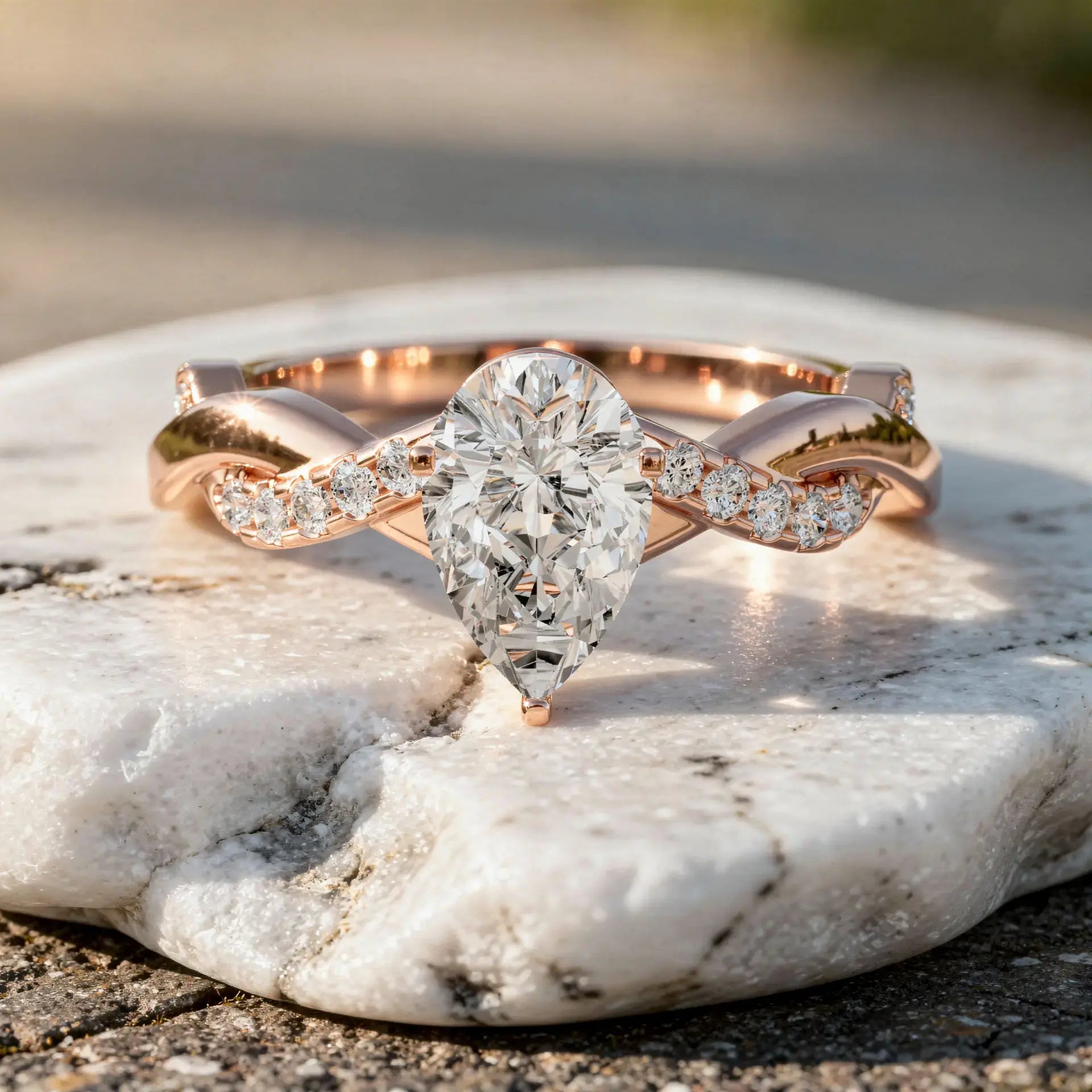 Front-view: Pear Cut Diamond Ring with Twisted Setting in 14k Rose Gold - Lab Grown - Driona Jewels