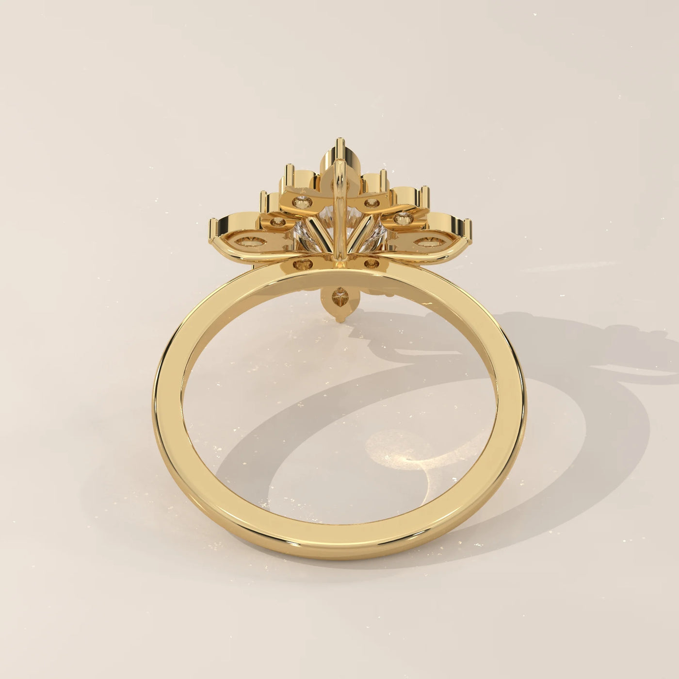 A yellow gold ring with a princess cut diamond and accent stones.