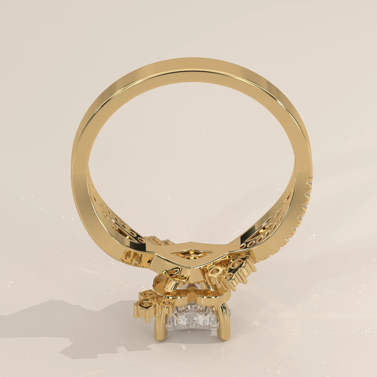 Yellow gold ring with a princess-cut center diamond and smaller accent stones.