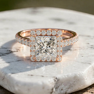 Flat Lay: Princess Diamond Engagement Ring with Halo Setting in 14k Rose Gold - Lab Grown - Driona Jewels
