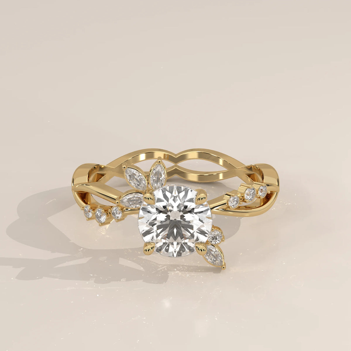 A delicate 14k yellow gold ring with a round diamond and leaf-like accents.