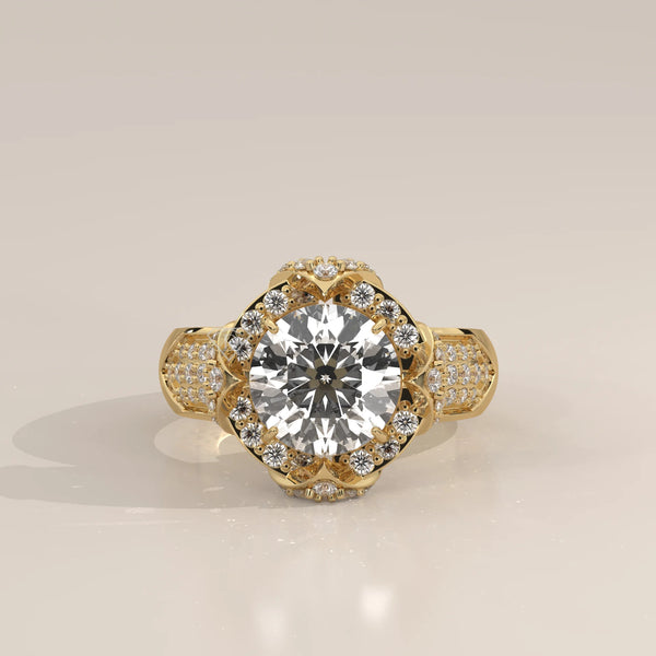 A round brilliant diamond engagement ring set in 14k yellow gold.