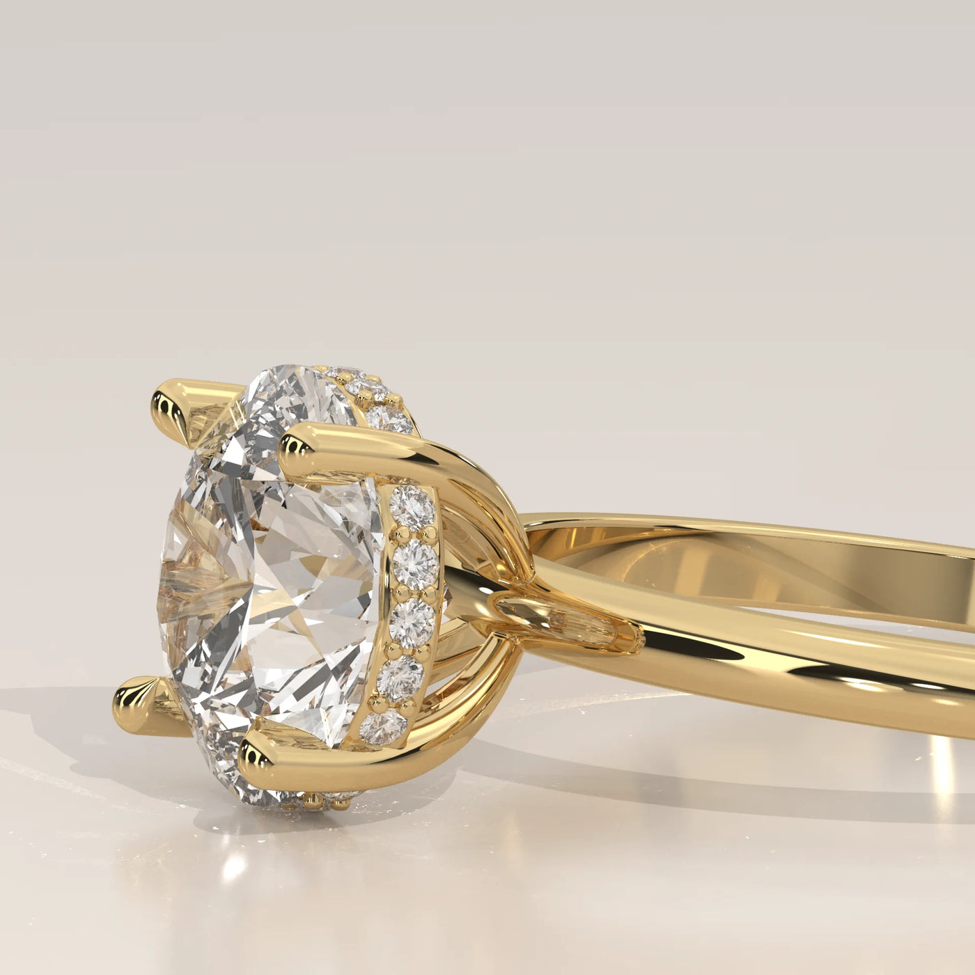 Gold ring with a round diamond and small accent diamonds.