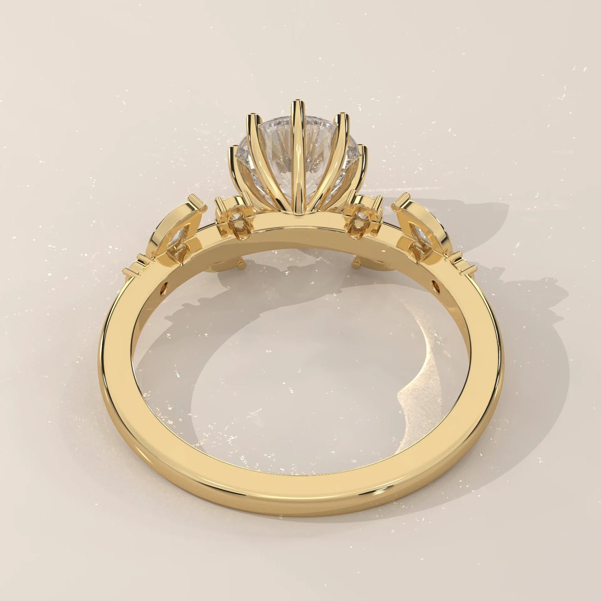 Gold ring with a round diamond and side stone accents.