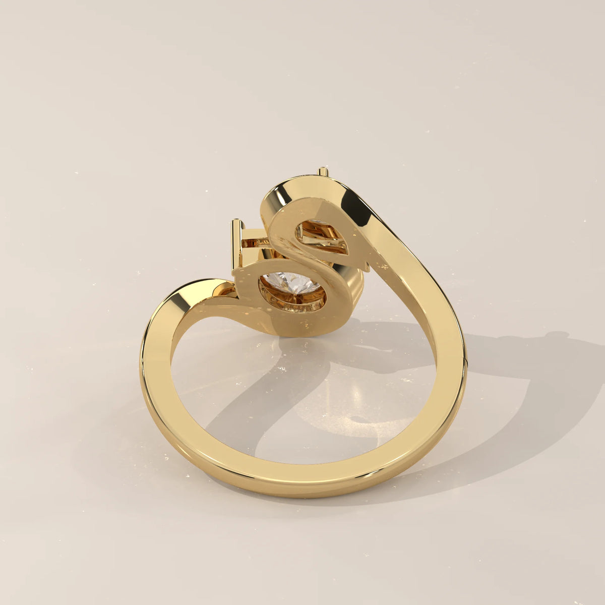 Two Pear Lab Grown Diamond Toi et Moi Ring with S Shaped Outline in yellow gold, shown from the side.
