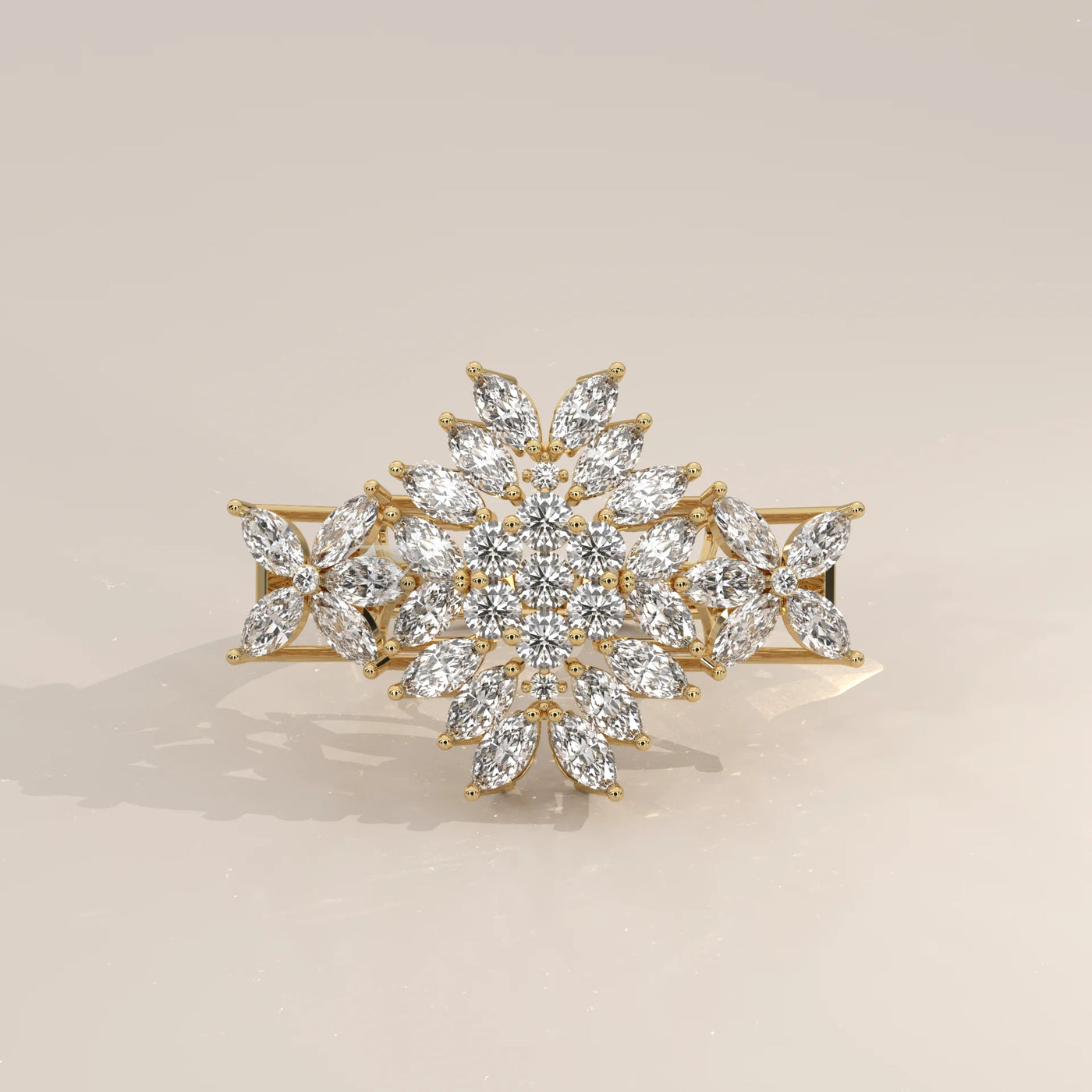 A sparkling snowflake-shaped ring with diamonds set in yellow gold.