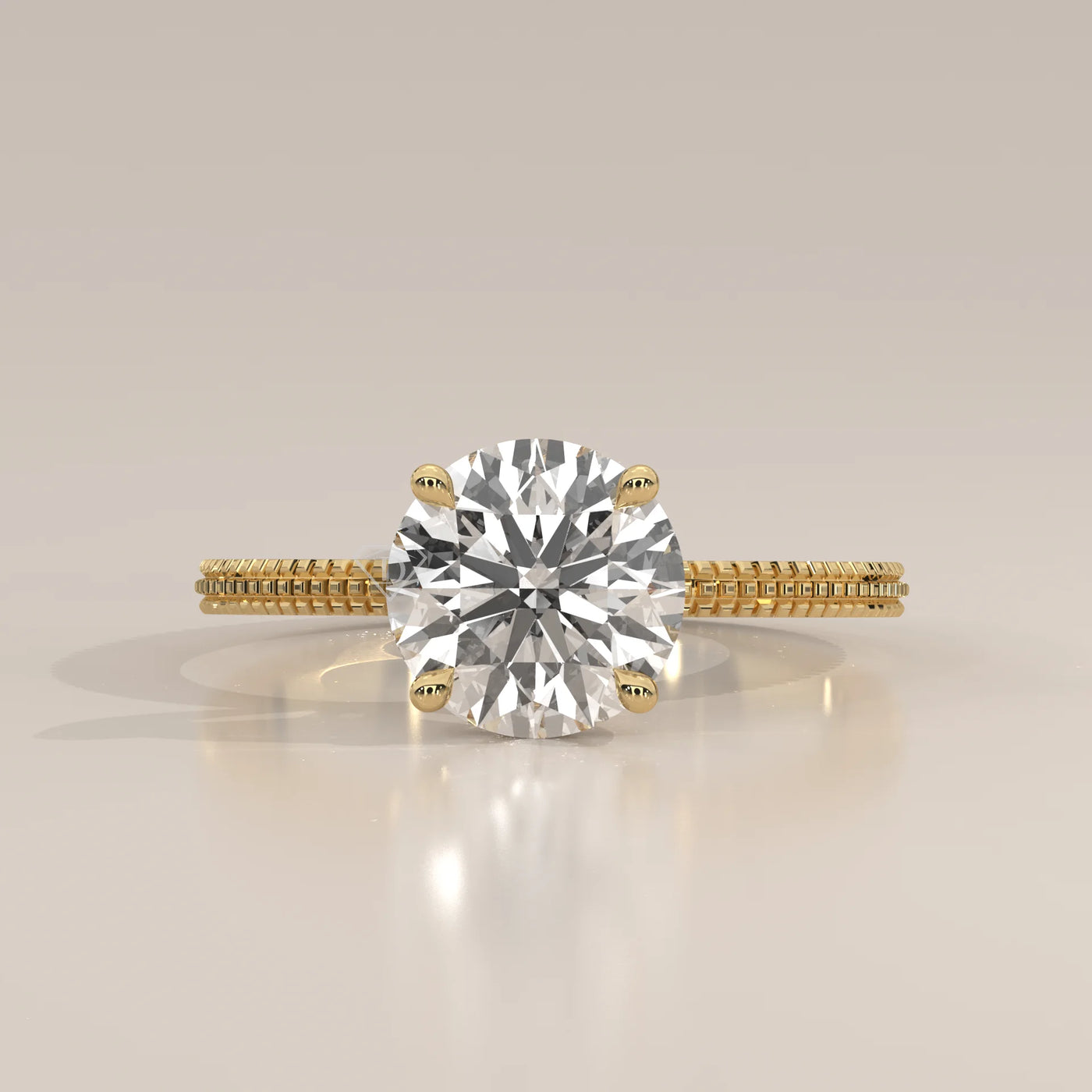A solitaire diamond ring with a detailed gold band.