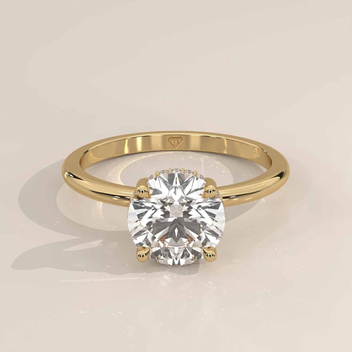 A classic solitaire diamond ring with a 14k gold band.