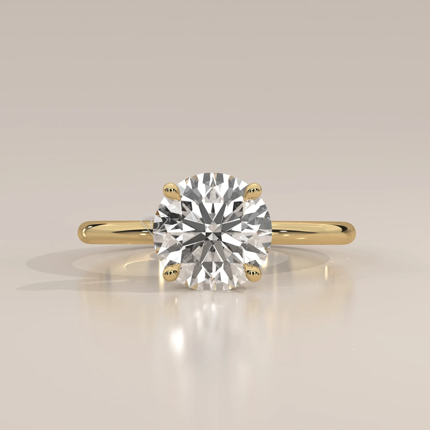 A classic solitaire diamond ring with a 14k gold band.