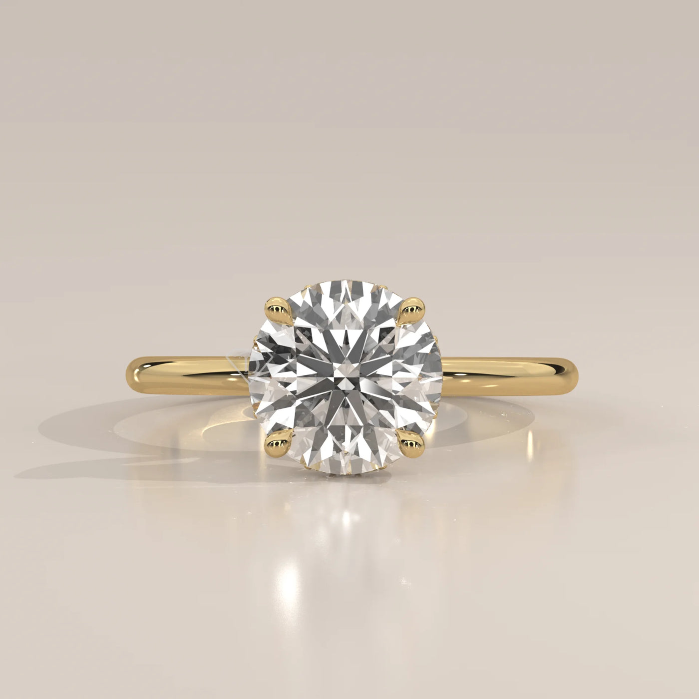 A classic solitaire diamond ring with a 14k gold band.