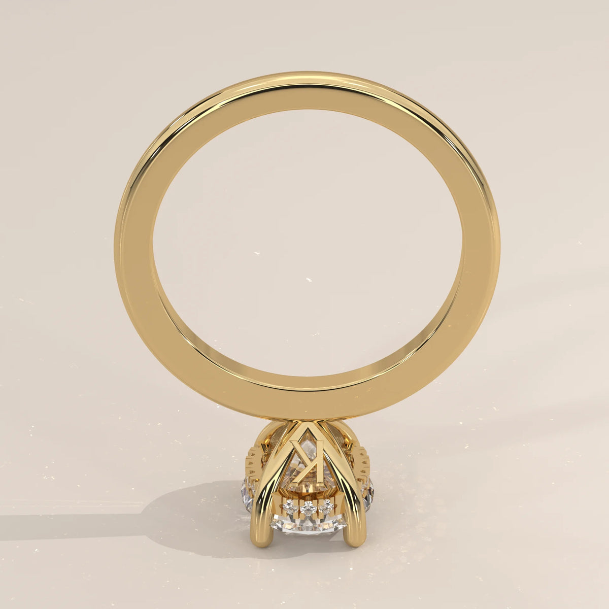 A detailed view of a 14k yellow gold ring with a central stone.