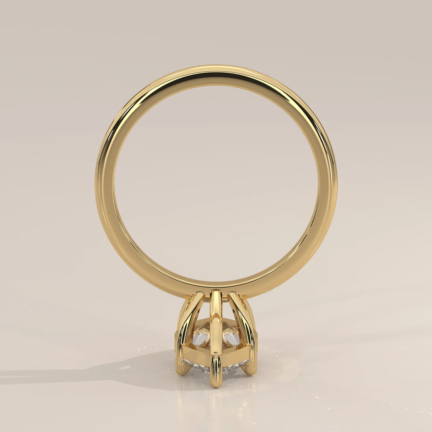A gold ring with a central diamond set in a hexagonal bezel setting.