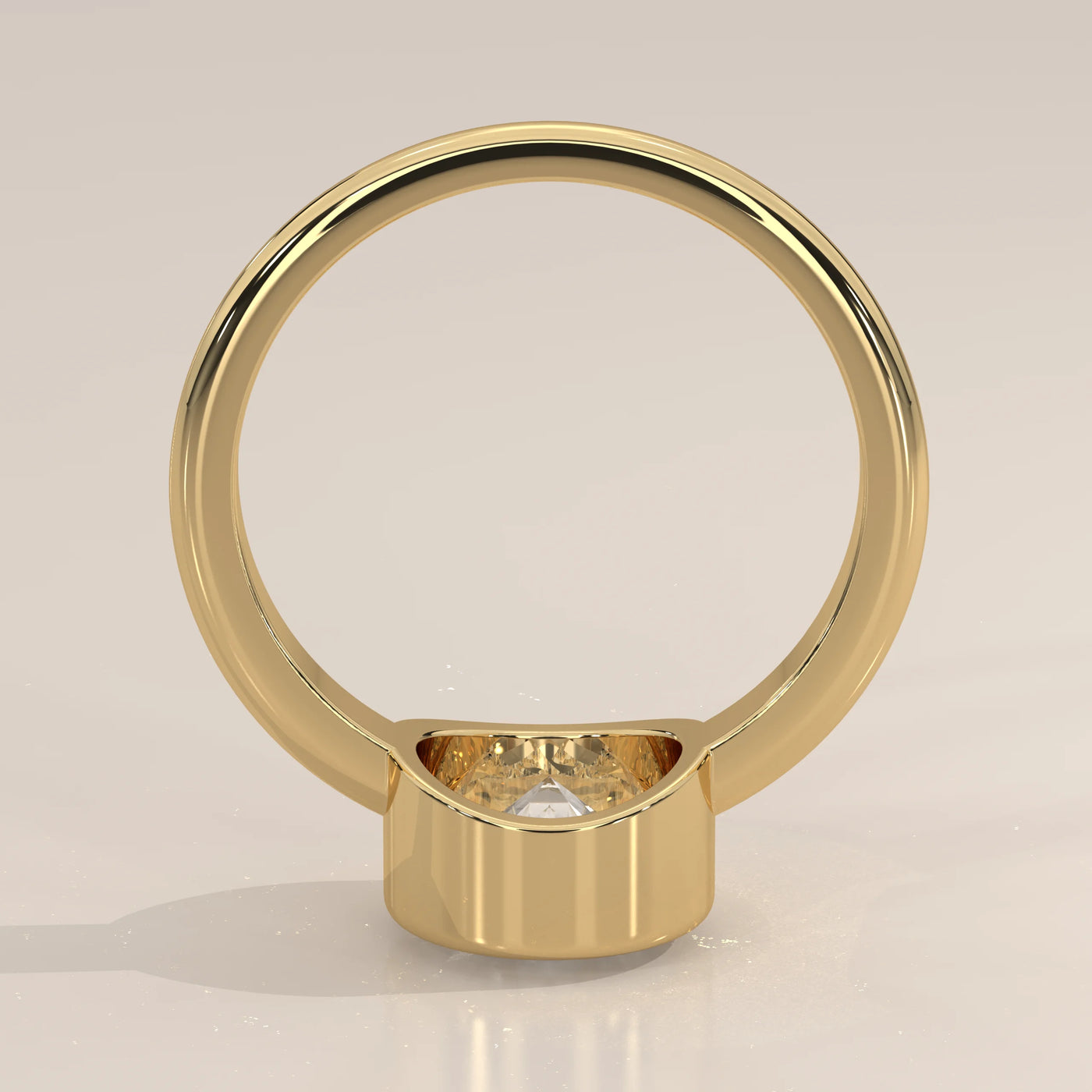 A classic 14k yellow gold ring with a large diamond and pave band.