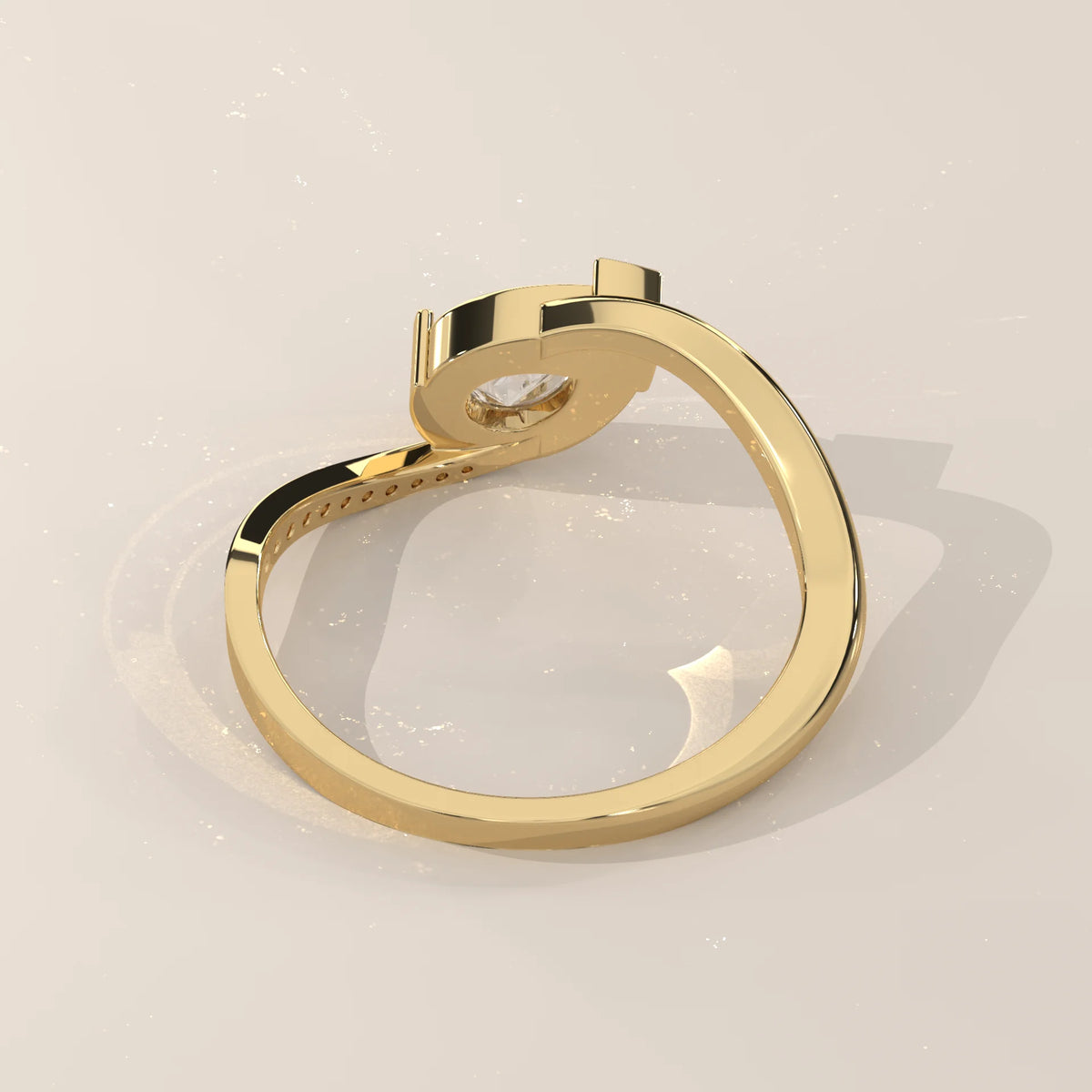 Pear Lab Grown Diamond Bypass Ring with Half Bezel and Pave Shoulder in yellow gold, side profile view.
