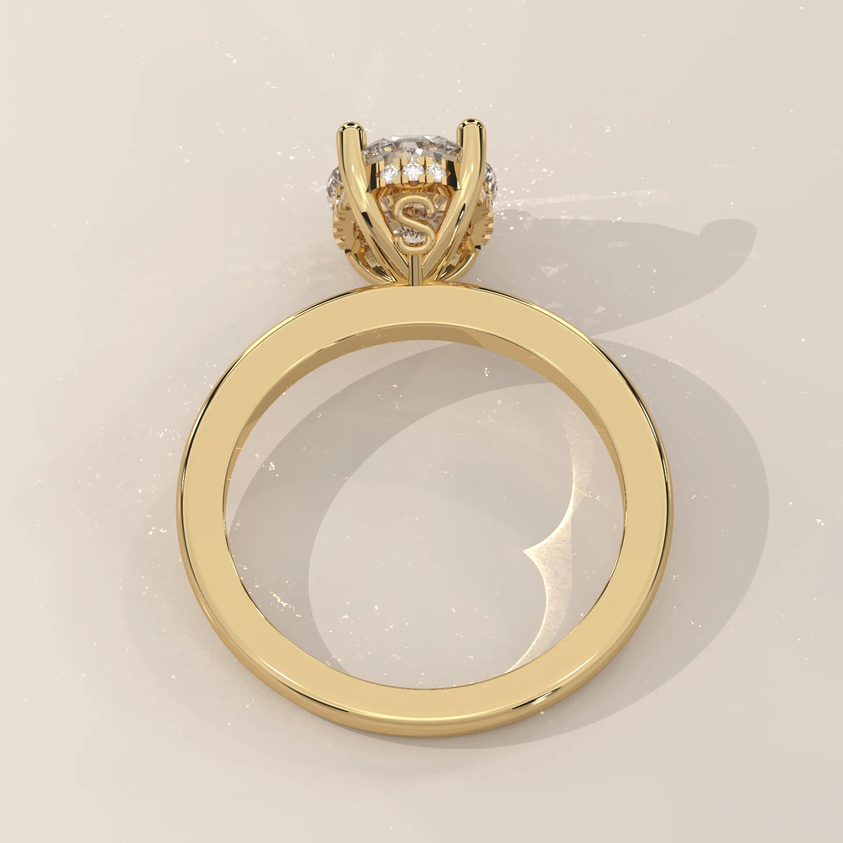 Oval Lab Grown Diamond Solitaire with Hidden Halo and Scroll Gallery in yellow gold, shown on a plain background.