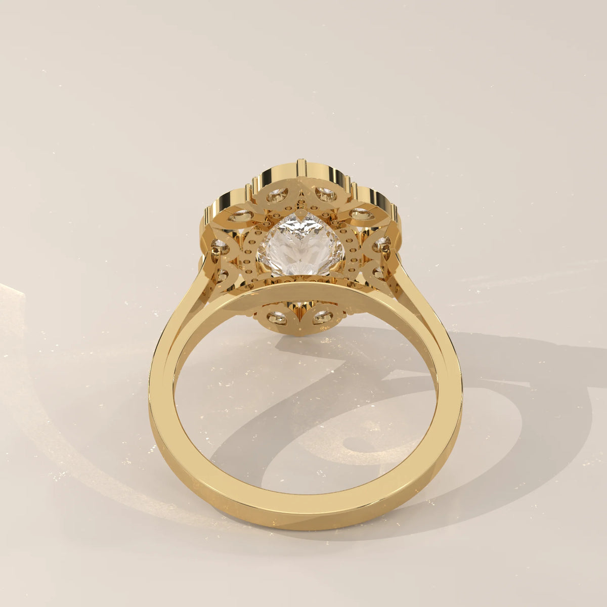 A classic yellow gold ring with a central diamond surrounded by smaller diamonds.