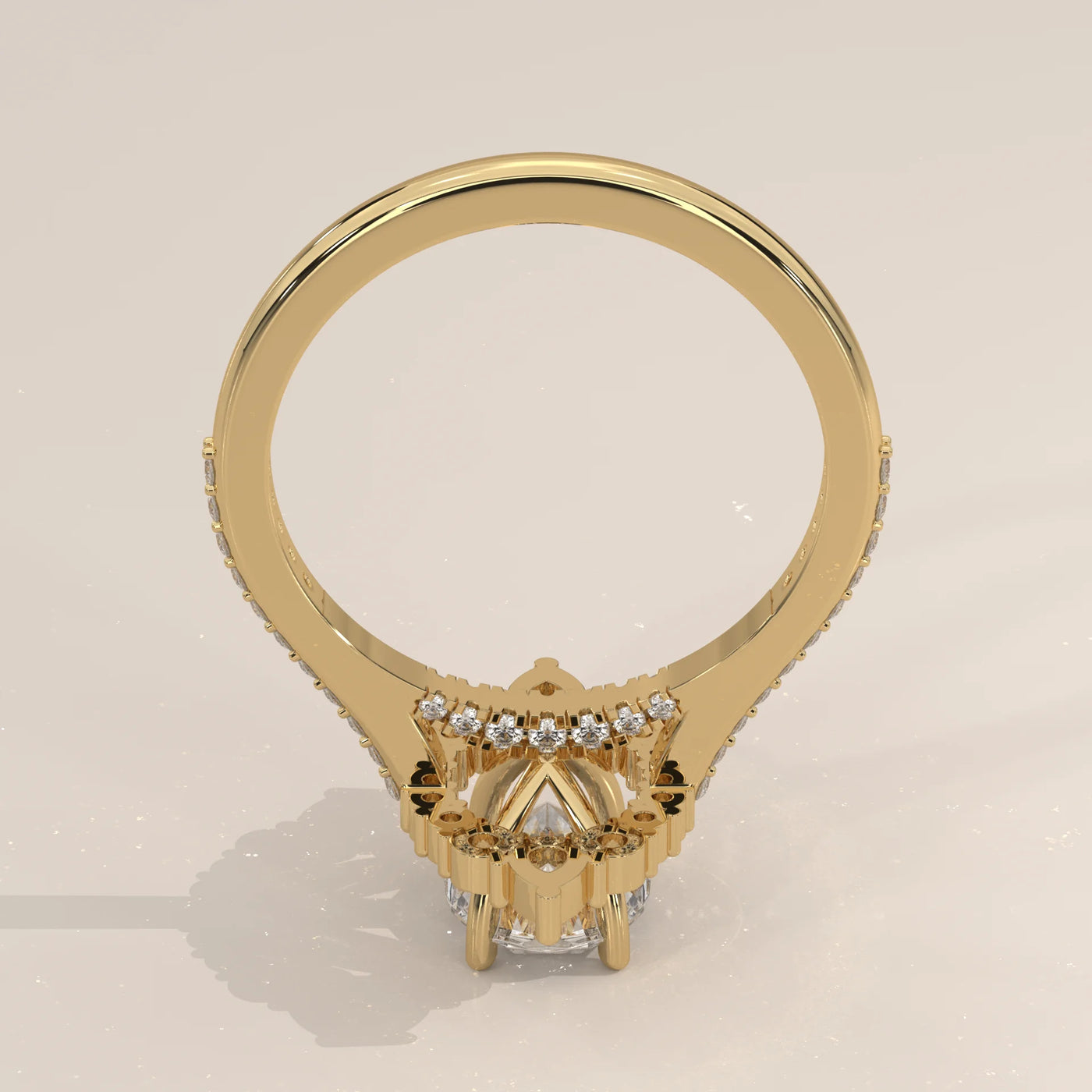 A diamond engagement ring with pave set diamonds on the band, in yellow gold.