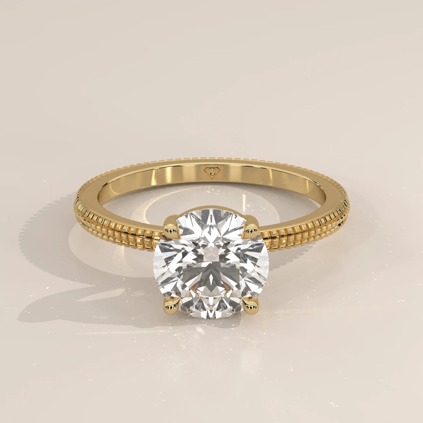 A classic solitaire diamond engagement ring in yellow gold with beaded detailing.