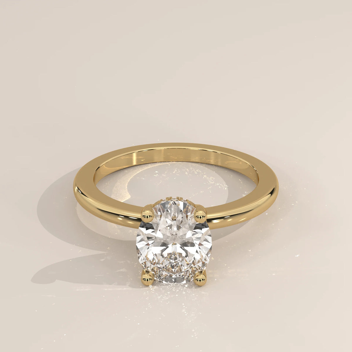 Oval Lab Grown Diamond Solitaire with Hidden Halo and Scroll Gallery in yellow gold, shown from the front.