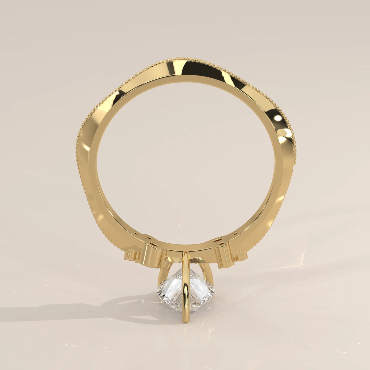 A 14k gold ring with a square-cut diamond, viewed from the side.