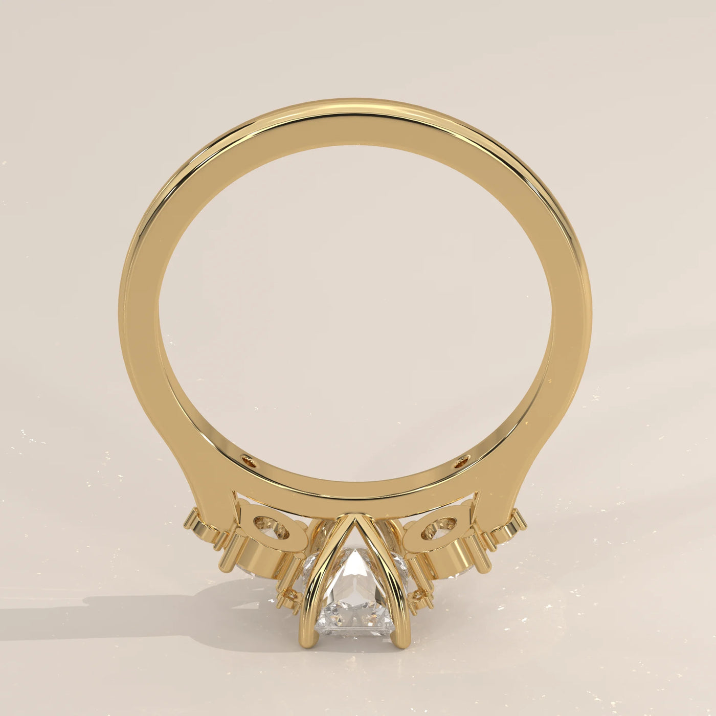 Gold ring with a trillion cut diamond and accent stones.