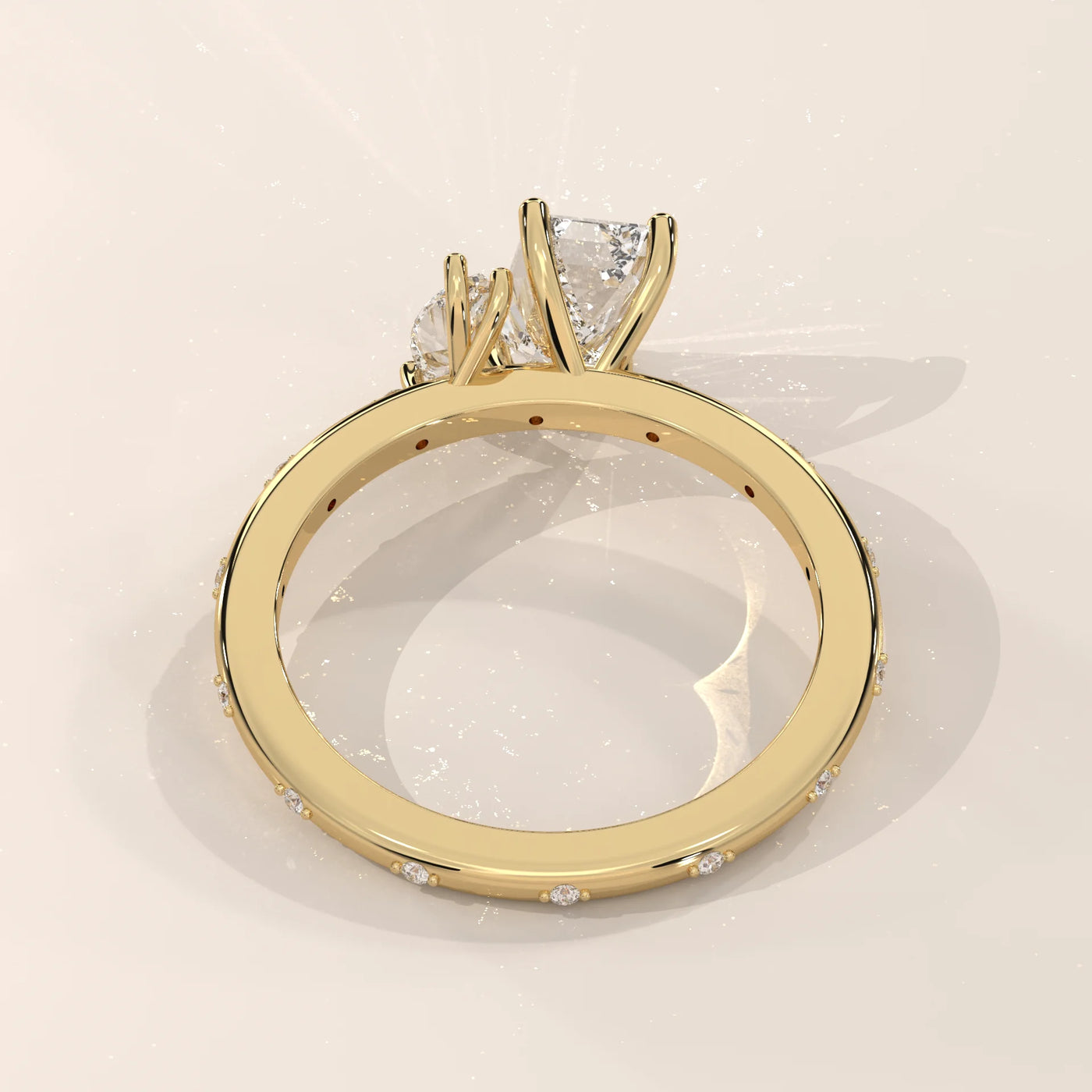 A 14k gold ring with a trillion cut diamond and accent stones.