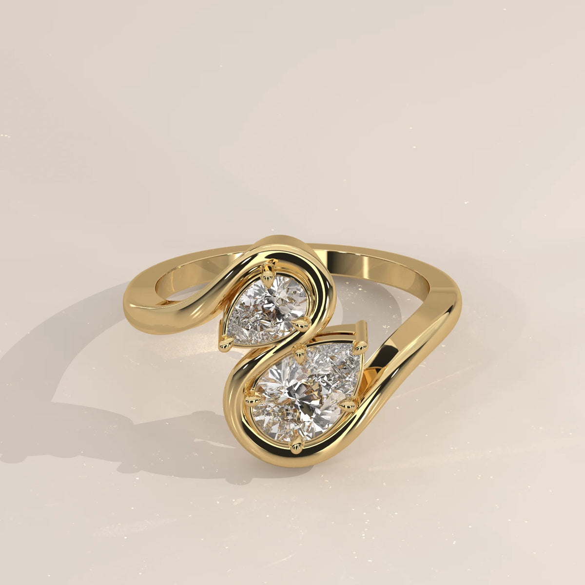 Two Pear Lab Grown Diamond Toi et Moi Ring with S Shaped Outline in yellow gold, shown from the front.