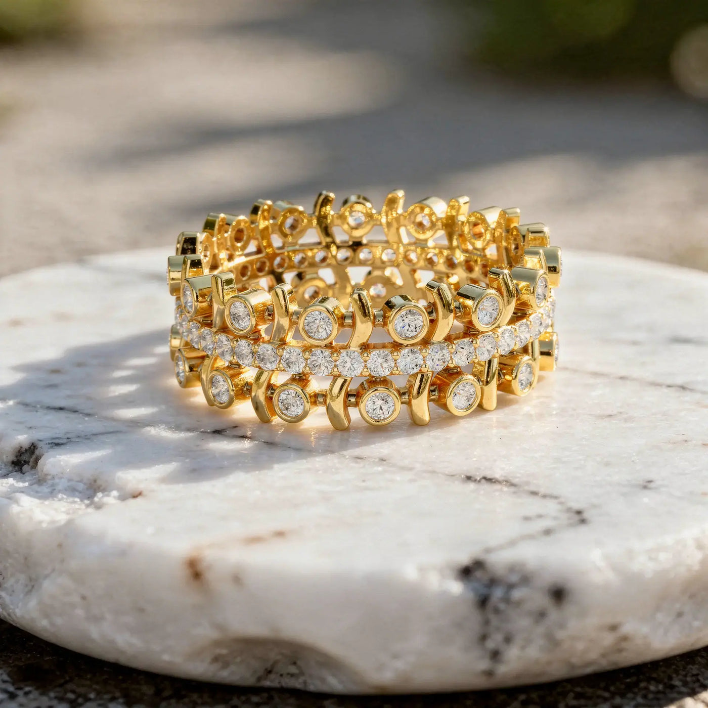 Flat Lay: Round Diamond Rings with Bezel Setting in 14k Yellow Gold - Lab Grown - Driona Jewels